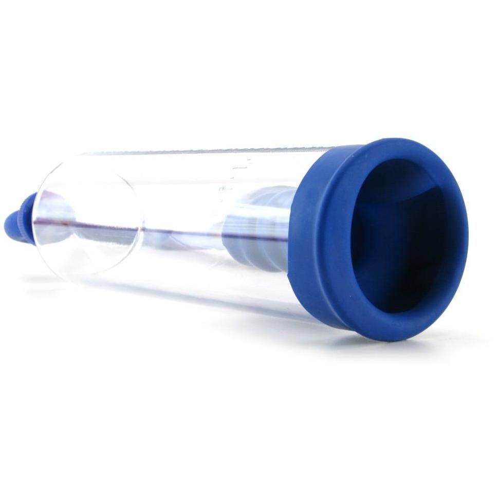 A Basic Essentials Pump by California Exotic Novelties, with a transparent plastic cylinder and blue rubber end for airtight sealing, is shown lying horizontally.
