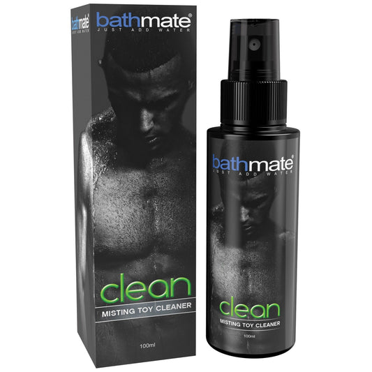 The image shows a Bathmate Clean Misting Toy Cleaner by Adams Toy Box, packaged in a sleek black pump spray bottle. It features a grayscale male torso with bathmate clean text. The paraben-free formula offers safe and effective toy cleansing.