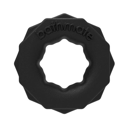 The Bathmate Spartan Cock Ring by Adams Toy Box is a black, textured silicone ring featuring a jagged outer edge and smooth inner circle with bathmate embossed on top. Its geometric, modern design adds sophistication to male rings.
