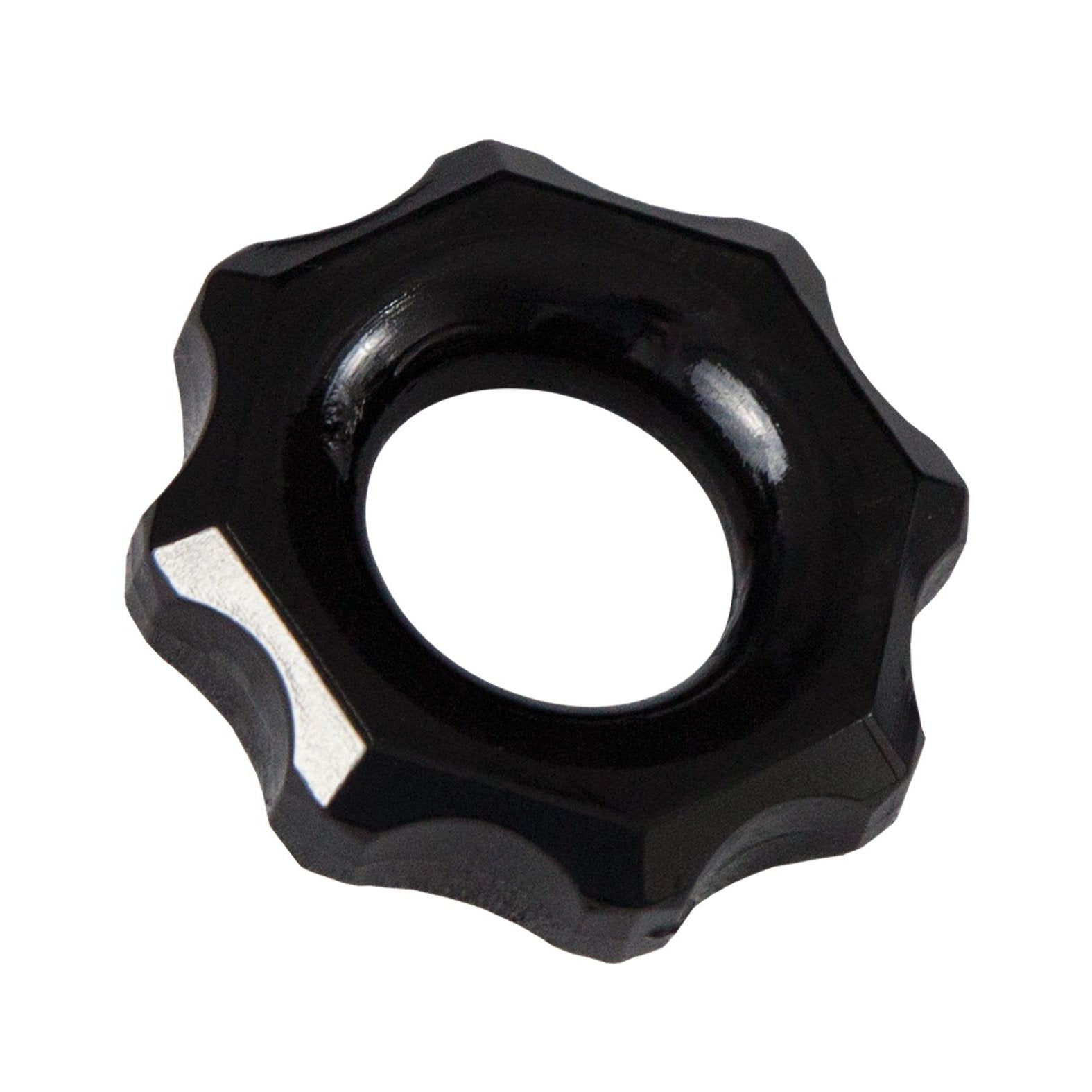 A black Bathmate Spartan Cock Ring from Adams Toy Box, featuring a ridged, gear-like design with a central hole, is set against a white background, evoking the bold style of male rings.