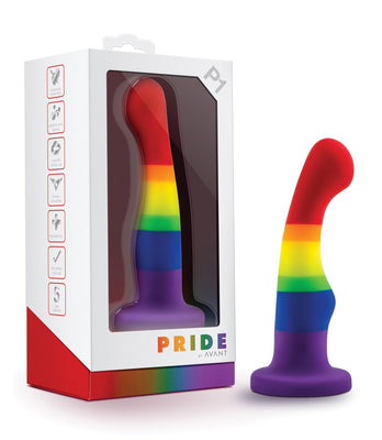 The Blush Avant P1 Silicone Plug - Gay Pride by Blush Novelties is a vibrant, rainbow-striped platinum cured silicone toy. Its box features matching imagery, body-safe and suction base icons. PRIDE is boldly displayed, and its harness compatible, perfect for those seeking artisanal toys.