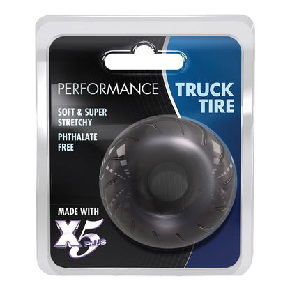 Introducing the Blush Performance Truck Tire Cock Ring by Blush Novelties, made with soft, super stretchy X5 Plus material. This phthalate-free wonder ensures endurance in all conditions and comes in sleek black-and-blue packaging adorned with bold white and silver text for those who demand the best.