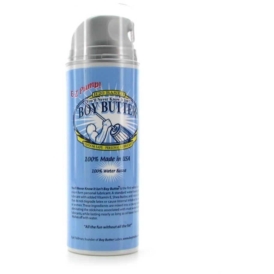 The Boy Butter Easy Pump - H2O is a latex-safe, water-based lube in a blue canister with pump top, featuring phrases like 100% Made in USA and Its Not Real Butter! Its packaging has light blue, white, and yellow accents.
