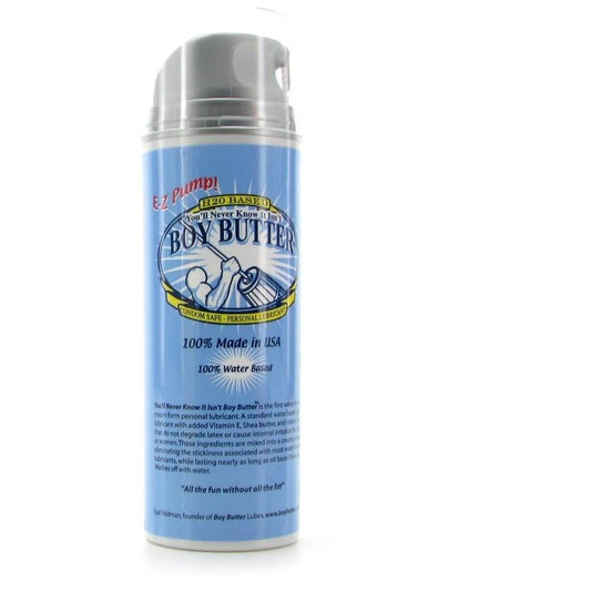 The Boy Butter Easy Pump - H2O is a latex-safe, water-based lube in a blue canister with pump top, featuring phrases like 100% Made in USA and Its Not Real Butter! Its packaging has light blue, white, and yellow accents.