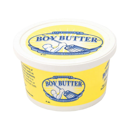 A white and yellow Boy Butter Original container features a strong figure churning butter, with Original above and Personal Lubricant below. Enhanced with coconut oil, this 8 oz product offers a unique variation on traditional silicone lubricants.
