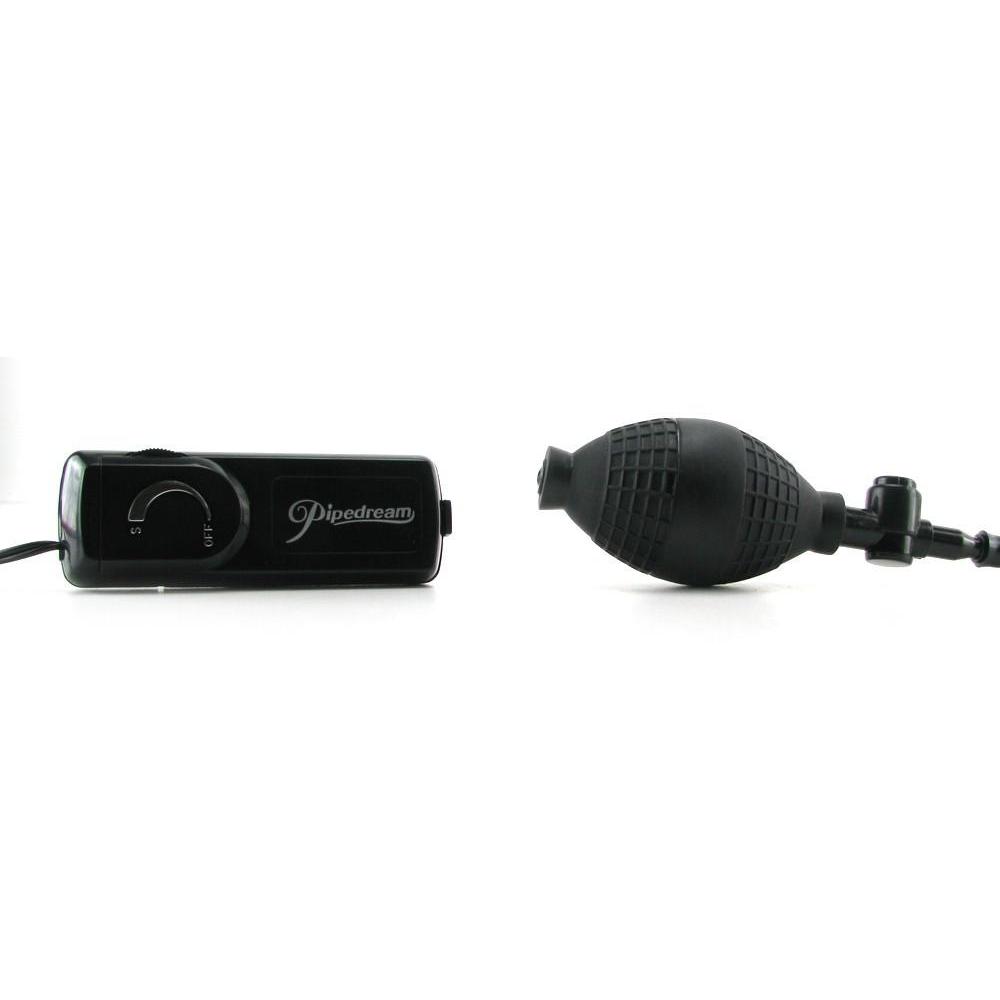 A black handheld controller with a dial and the Pipedream brand is shown beside a black Vibrating Classix Power Pump bulb with tubing, featuring a quick release valve, all against a plain white background.