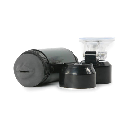 The Cyberskin Stealth Double Stroker by Adams Toy Box is a sleek black cylinder with a textured cap and CyberSkin inner sleeve for enhanced sensation. It includes a transparent mount for hands-free pleasure, all displayed on a white background.