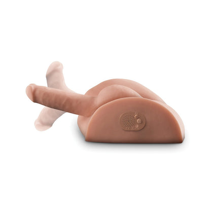 The PDX Dirty Talk PDX Fuck Him Silly Masturbator simulates realistic interaction by incorporating an enhanced feature for practice. It is positioned on a flat surface with slightly elevated limbs.