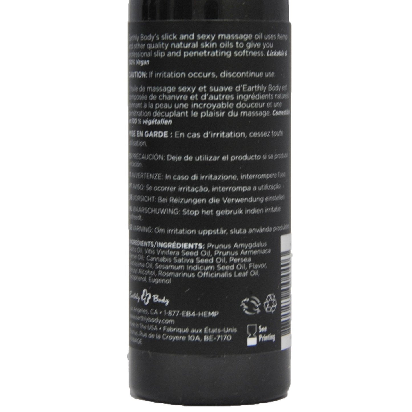 The back label of Earthly Body Edible Massage Oil Gift Set showcases a detailed description and caution, highlighting its natural skin oils like sweet almond oil and rosemary extract suitable for massage. Ingredients and notes are provided in multiple languages.