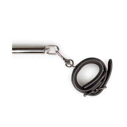 A close-up image of the Easy Toys Expander Spreader Bar & Cuffs Set shows a silver handle with a black rubber rope connected by a metal clip, reminiscent of sleek bondage gear.