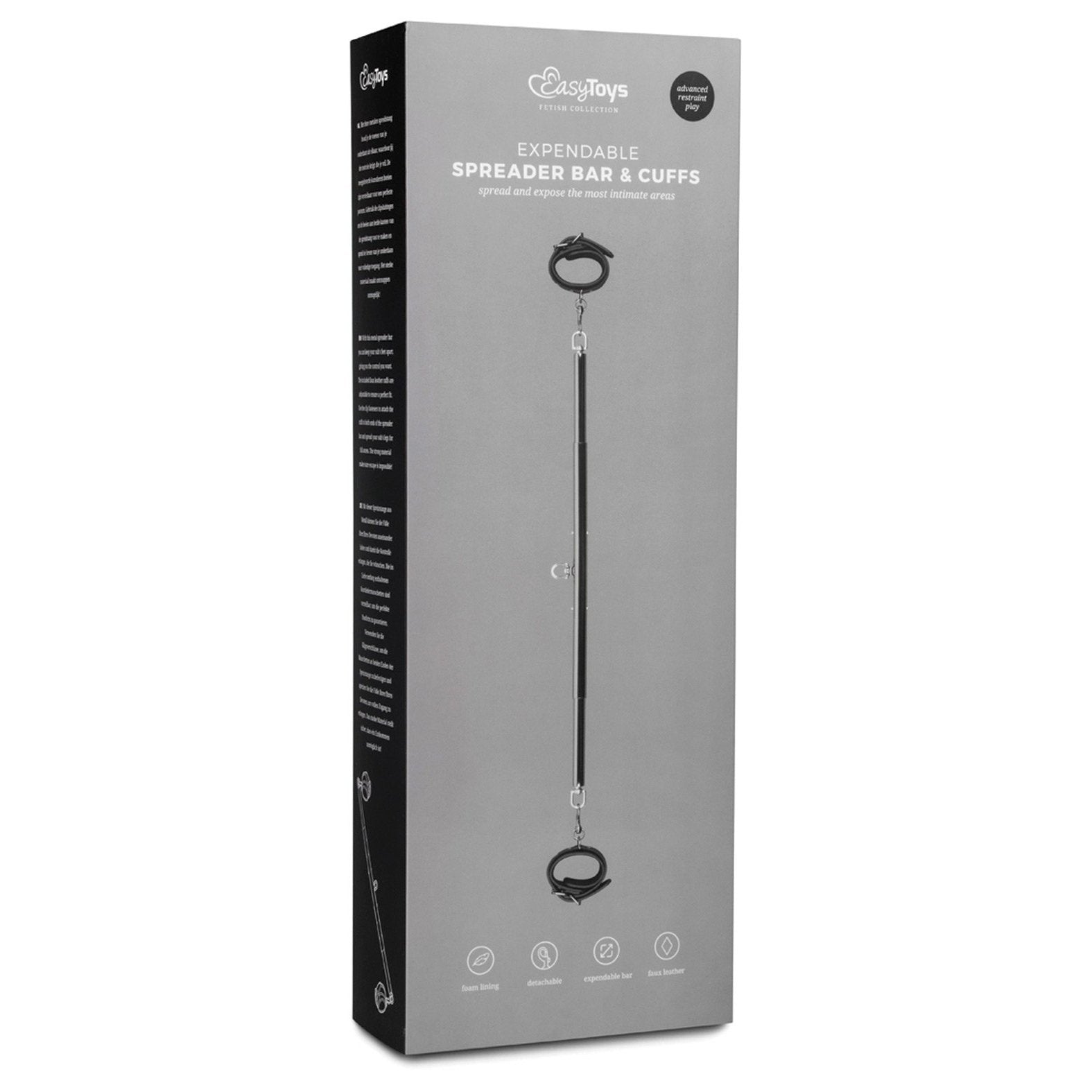 The Easy Toys Expander Spreader Bar & Cuffs Set is a must-have in bondage gear. The packaging is gray with white text, showcasing an image of the metal spreader bar and adjustable faux leather cuffs. Branding and product details are clearly visible.