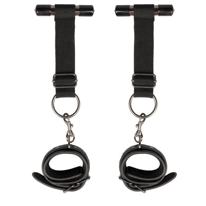 The Easy Toys Over The Door Wrist Cuffs by Easy Toys are black faux leather suspension cuffs with adjustable straps, metal clasps, padded interiors for comfort, and sturdy metal rings for secure hanging as bondage restraints.