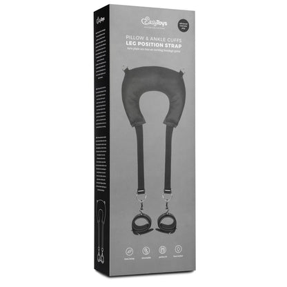 The Easy Toys Pillow & Ankle Cuffs Leg Position Strap by Adams Toy Box features faux leather ankle cuffs with a pillow and adjustable straps. Metal buckle attachments enhance comfort, while branding and icons highlight its versatility as a sex positioning device.