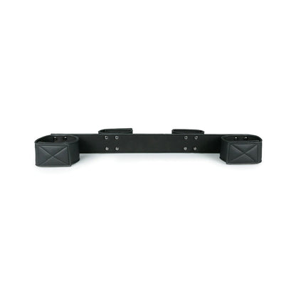 The Easy Toys Wrist & Ankle Bondage Bar offers a bold black design with reinforced stitching and durable metal hardware. Reminiscent of BDSM elements, this sleek accessory adds an edgy touch, suitable for various styles and secure attachment.