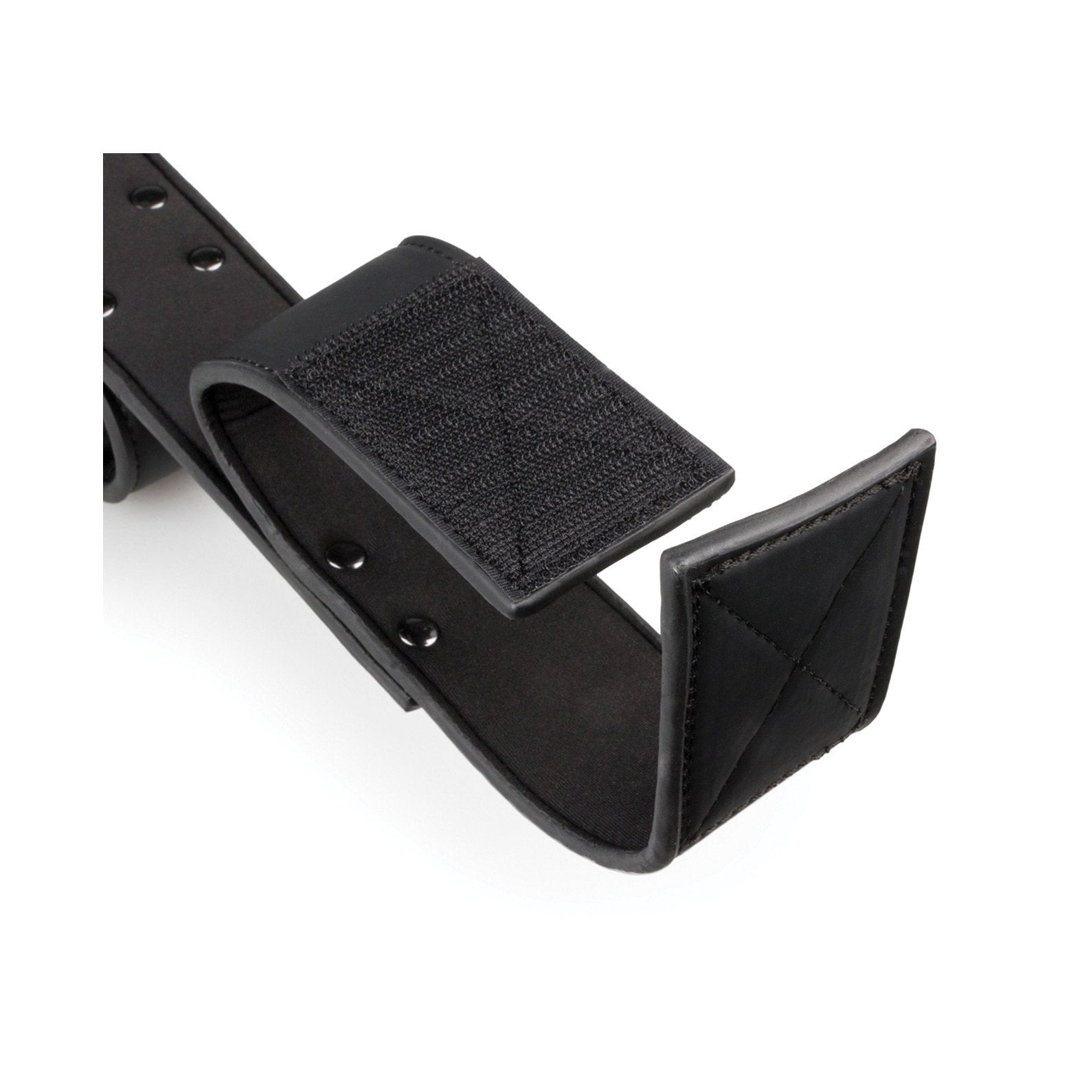 The Easy Toys Wrist & Ankle Bondage Bar features a close-up on a black leather strap with metal rivets, Velcro for adjustable fastening, and a padded end for comfort. Its BDSM-inspired design promises durability, reminiscent of faux leather cuffs.