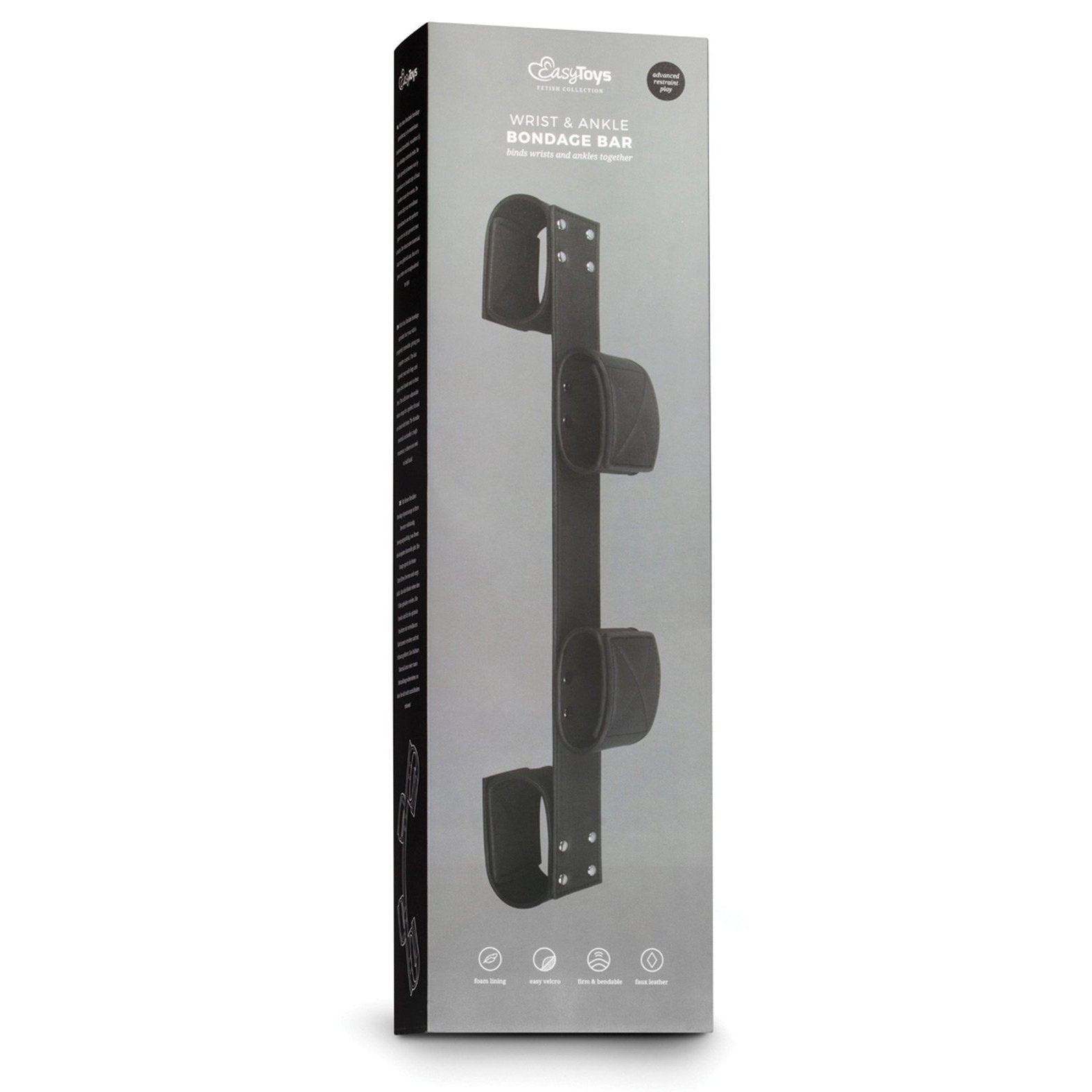 The Easy Toys Wrist & Ankle Bondage Bar comes in a sleek black box, showcasing its faux leather cuffs for restraint. The elegant packaging includes images and white text, adding sophistication to your BDSM collection.