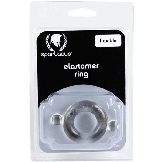 The packaging for Adams Toy Box Elastomer Cock Ring Clear is labeled flexible. The circular product promises firmer erections, visible in transparent plastic against a black background, with the brand logo prominently above.