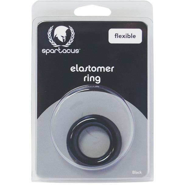 The Elastomer Relaxed Fit Cock Ring by Spartacus is visible through a clear plastic section of its packaging. This sleek black rings package highlights the product type and brand, promoting stronger erections and long-lasting stamina.