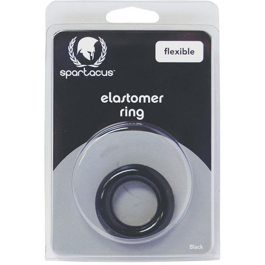 The Elastomer Relaxed Fit Cock Ring by Spartacus is visible through a clear plastic section of its packaging. This sleek black rings package highlights the product type and brand, promoting stronger erections and long-lasting stamina.