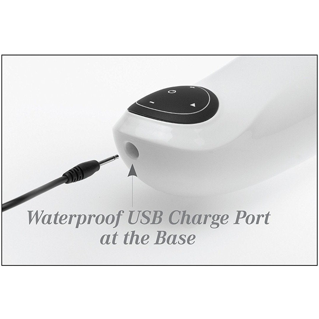 A close-up showcases Adams Toy Box Extreme Toyz Mega Bator, a USB-rechargeable masturbator with a black control panel. A cable connects to its waterproof USB charge port at the base for reliable convenience. Text: Waterproof USB Charge Port at the Base.