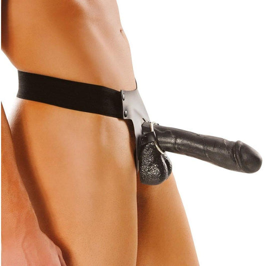 A person wears the Fetish Fantasy Series Big Daddy Hollow 10 Strap-On from Adams Toy Box, showcasing a realistic black dildo against a neutral backdrop.
