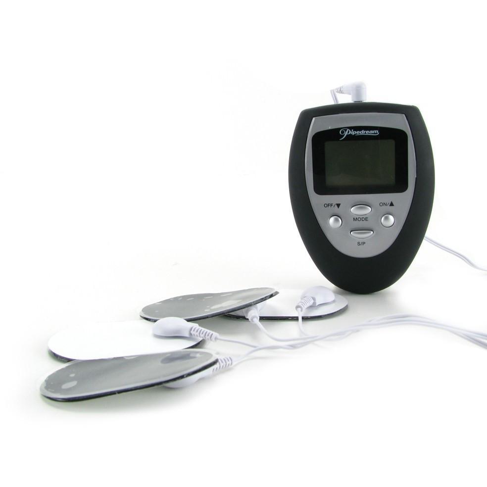 The Pipedream Fetish Fantasy Series Shock Therapy Electro Sex Kit includes a sleek black and silver control unit with gray electrode pads connected by wires. The display screen and buttons make it easy to control for an electrifying experience.