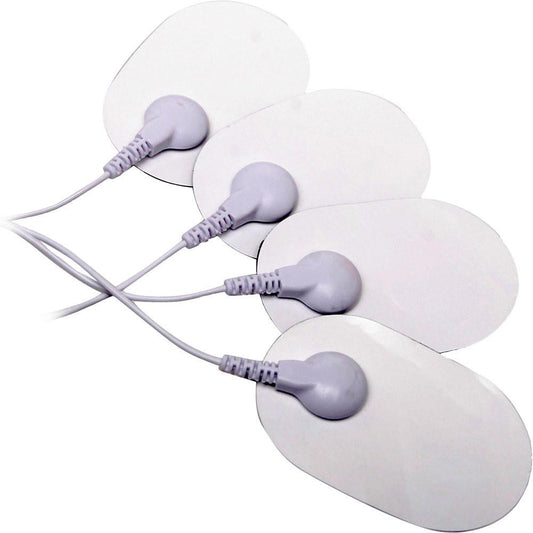 Twelve white oval electrode pads with purple connectors and attached wires from Pipedreams Fetish Fantasy Therapy Replacement Pads set are neatly laid out on a white background.