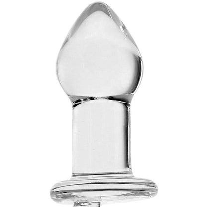 The Gläs 5 Juicer Butt Plug is a clear, handmade glass object with a smooth, rounded top and flat base, featuring a reflective and polished surface suitable for decorative or personal use, including temperature play.