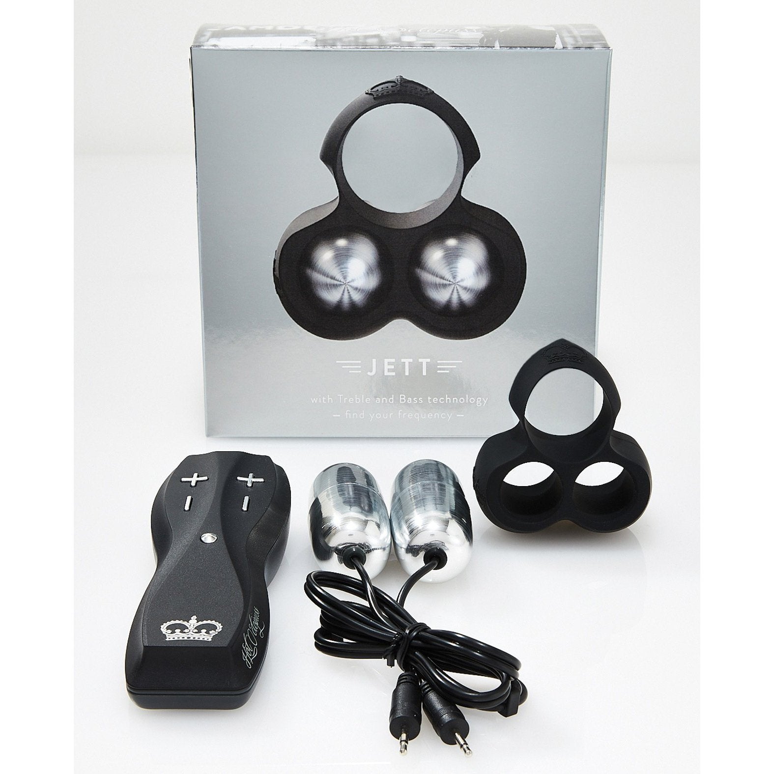 The Hot Octopuss Jett Remote Guybrator includes a remote, two bullet-like components, a black rubber ring, and a cable. The packaging features the brands name and highlights JETT with Treble and Bass Technology.
