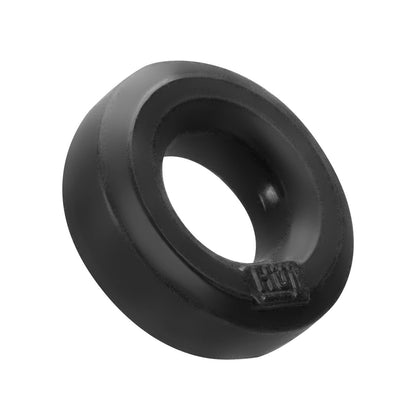 A rubber grommet with a circular design and small raised edge resembles the Hunky Junk C Ring - Singles from Hunky Junk. It features a central hole for cable management or protection, with a smooth silicone blend surface that has a subtle sheen.