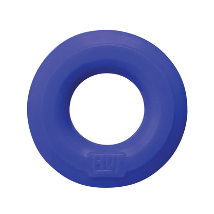 A view from above reveals the Hunky Junk C Ring—Singless in blue. Crafted from a silicone blend, this circular dog toy features a smooth surface with an embossed logo near the edge and a hollow center.