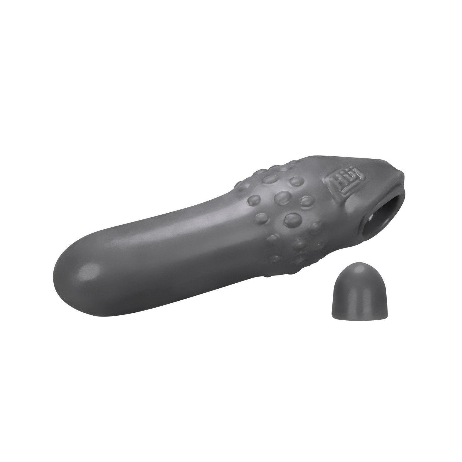 A gray, pickle-shaped stroker labeled Hunky Junk Swell Adjust Fit Cocksheath by Adams Toy Box has a bumpy texture, made of soft plus+silicone material. A small, removable cap fits securely over the thinner end.