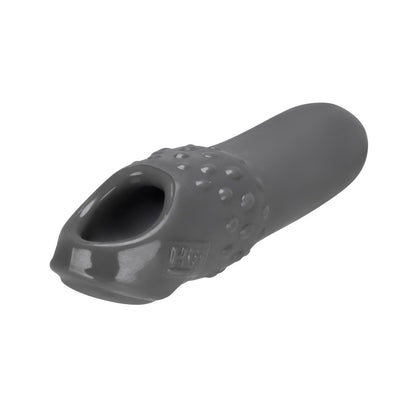 The Hunky Junk Swell Adjust Fit Cocksheath from Adams Toy Box is crafted from plus+silicone material, featuring a textured surface and a wide end opening to fit over the finger, providing enhanced grip or protection.