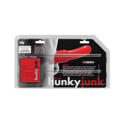 Introducing Adams Toy Boxs Hunky Junk Swell Adjust Fit Cocksheath, a red silicone toy made from premium plus+silicone. Its sleek design ensures smooth use and extra stimulation, while additional accessories enhance your experience.
