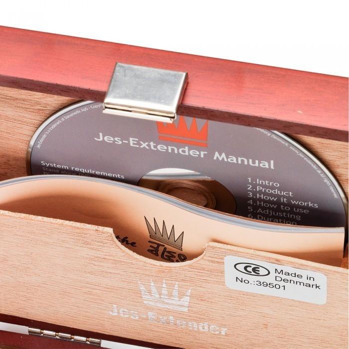 The Jes Extender Original Standard Penis Enlarger Kit comes in a wooden box with a secure metal clasp, containing both a manual on CD and a booklet. The elegantly crafted storage bears the Made in Denmark label, offering discreet storage for your penis enlargement journey.