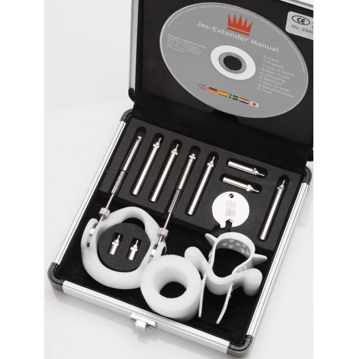 The Jes Extender Titanium Penis Enlarger Kit by Jes comes in a black case with a branded emblem, featuring metallic rods, a plastic support mechanism, silicone rings, and a manual CD. Its a non-surgical method for penis enlargement.