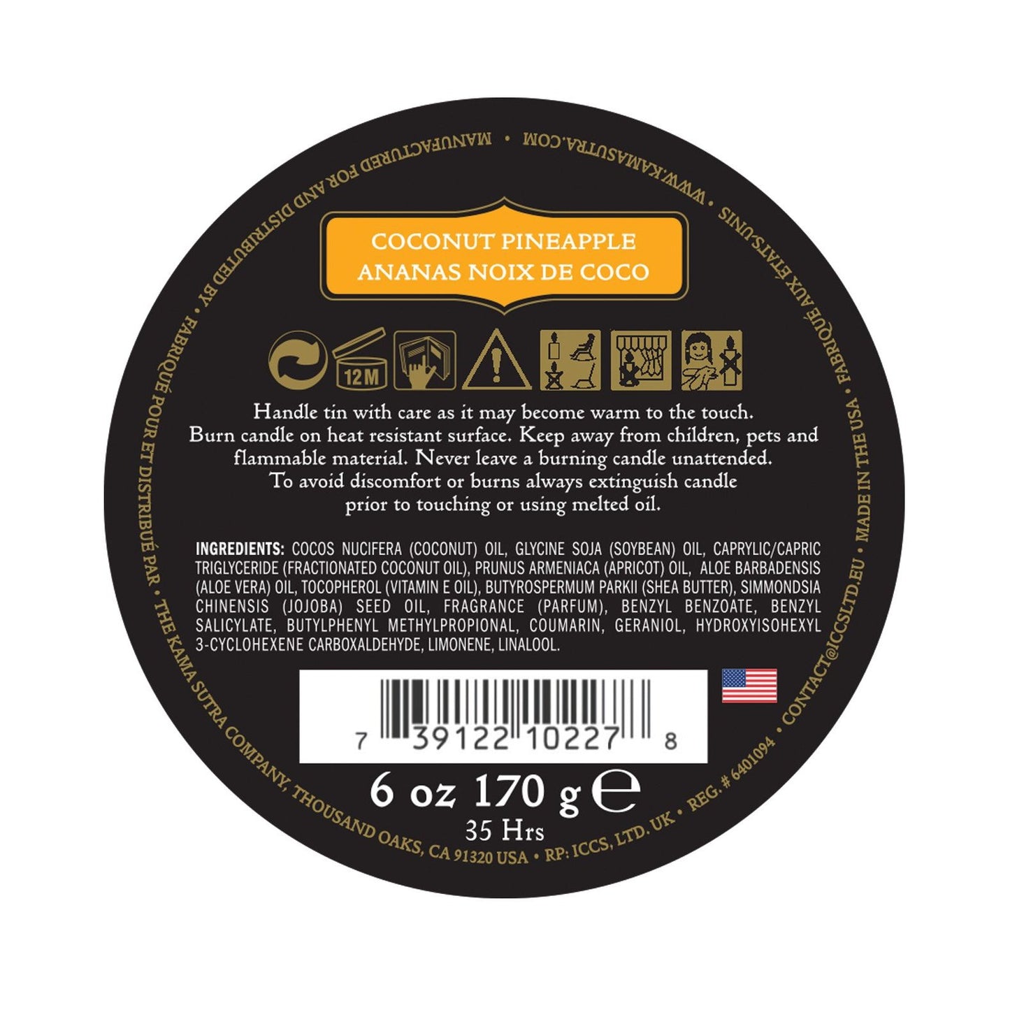 The Karma Sutra Ignite Massage Candle Coconut Pineapple features a round label, safety warnings, and a barcode. It provides a 35-hour burn time with ingredients and manufacturing details included, making it a delightful addition to any sensual massage experience.