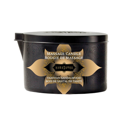 A black container with intricate patterns labeled Kama Sutra Ignite Massage Candle and Karma Sutra in gold. It features a gold star design, moisturizing formula, and coconut pineapple scent, offering a luxurious massage experience.