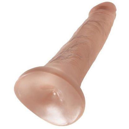 The Pipedream King Cock 5 Cock offers a life-like experience with its flesh-toned, veined texture and subtly curved tip. It features a suction cup base for hands-free use and is displayed against a white background.
