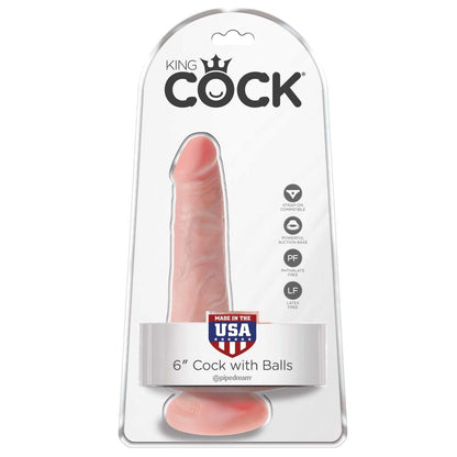 The transparent packaging of the King Cock 6 Cock with Balls features lifelike skin and a strong suction cup base. Made in the USA, this genuine piece is prominently displayed.
