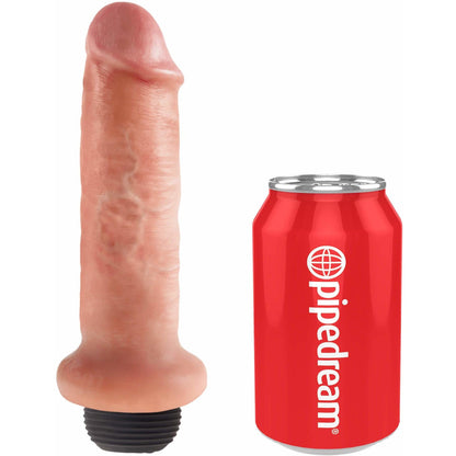 The King Cock 6 Squirting Realistic Dildo by Pipedream is shown beside a red pipedream can for size comparison. Its skin-like tone and textured details stand out against a minimalist white background, emphasizing its lifelike design.