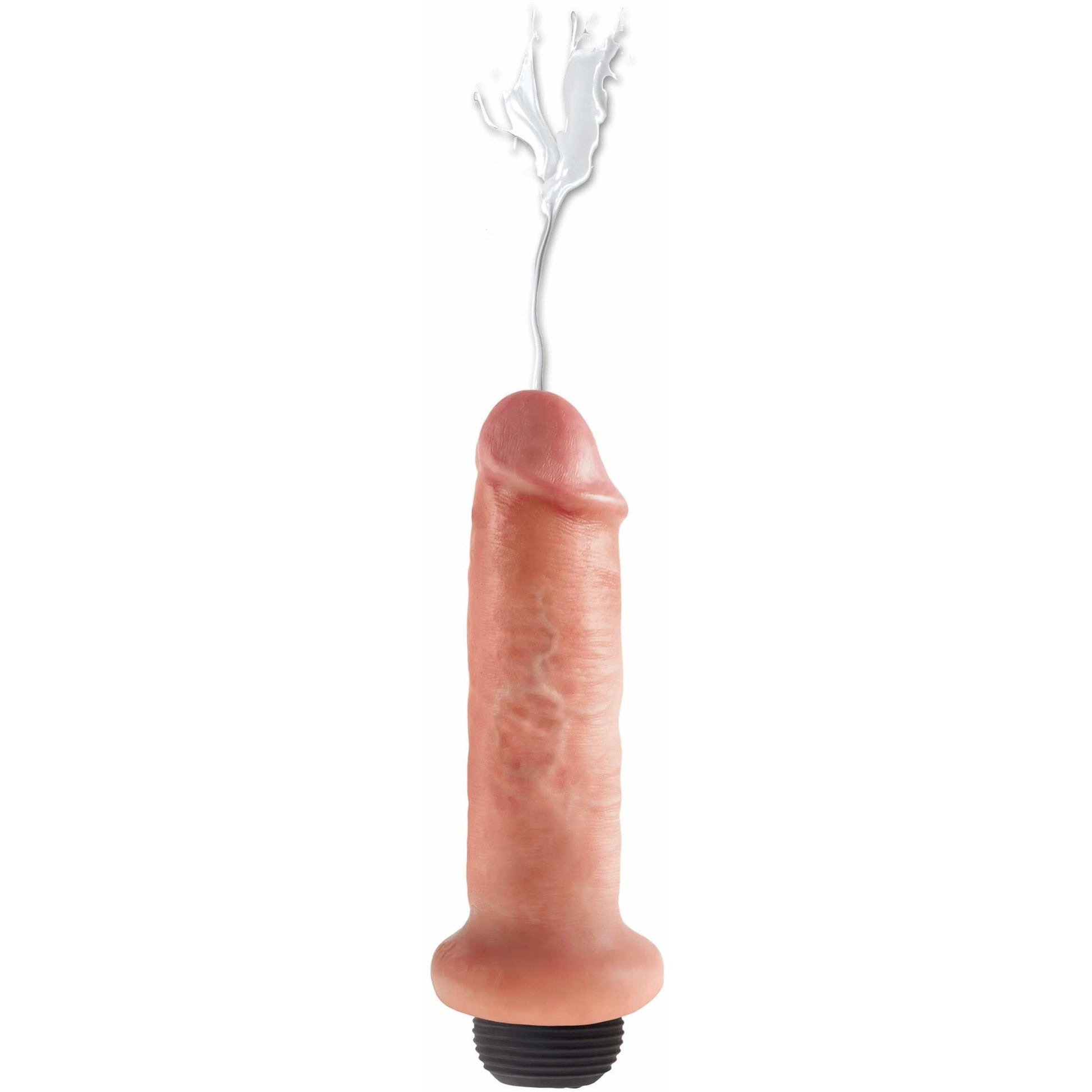 The King Cock 6 Squirting Realistic Dildo by Pipedream features a flesh-toned finish, a white liquid detail at the tip, and a textured black base for an enhanced lifelike appearance.