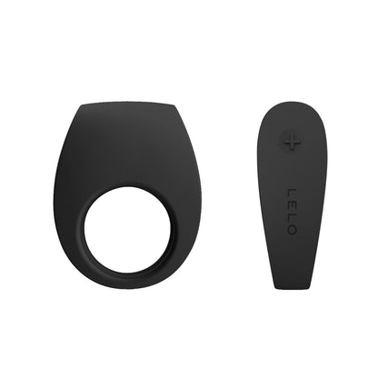The LELO Tor 2, a black vibrating cock ring with a circular opening, is displayed next to a small black LELO-labeled remote featuring a + button. This waterproof device has a rechargeable battery and is set against a plain white background.