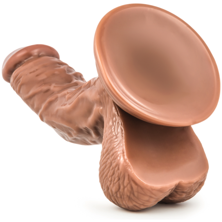 The Loverboy 5.8 Papito silicone dildo, in light brown, includes a suction cup base with realistic textures for P-Spot stimulation and is shown horizontally on a plain white background.