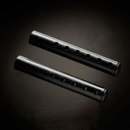 The Male Edge Extra Penis Enlarger Kit includes two rods with evenly spaced holes, showcased diagonally against a dark gradient background.