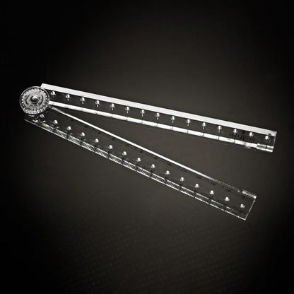 A Male Edge Extra Penis Enlarger Kit protractor with two clear rulers forms a semi-circular shape on a dark background, featuring measurement markings and a circular pivot point, symbolizing the precision of the Male Edge system.
