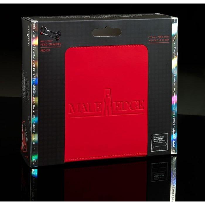 The image displays a sleek black packaging box with a red panel featuring the Male Edge Pro logo. Described as a penis enlarger pro kit, it uses advanced traction technology to suit all sizes. The glossy finish adds an elegant touch.