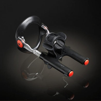 The Male Edge Pro Penis Enlarger Kit by Male Edge features a sleek black and silver design, with dual handles accented by red tips. It uses advanced traction technology and includes a circular section, set against a dark background.