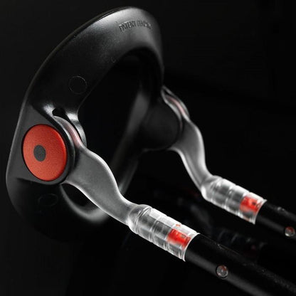 Close-up of the Male Edge Pro Penis Enlarger Kit, featuring its sleek black and silver design with red accents against a dark backdrop, highlighting its advanced traction technology for an enhanced experience.