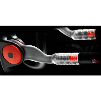 Close-up of the Male Edge Pro Penis Enlarger Kit, with its sleek black and red design and transparent elements, highlighting advanced features against a dark background.